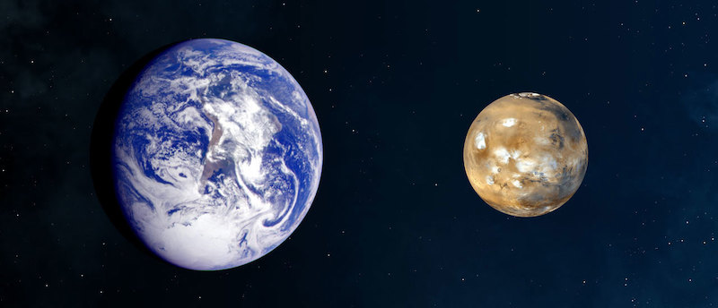 Space photos of Earth and Mars side by side, on black background, with Earth much bigger.